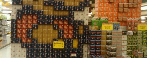 Super Mario made out of soda pop cases at the store